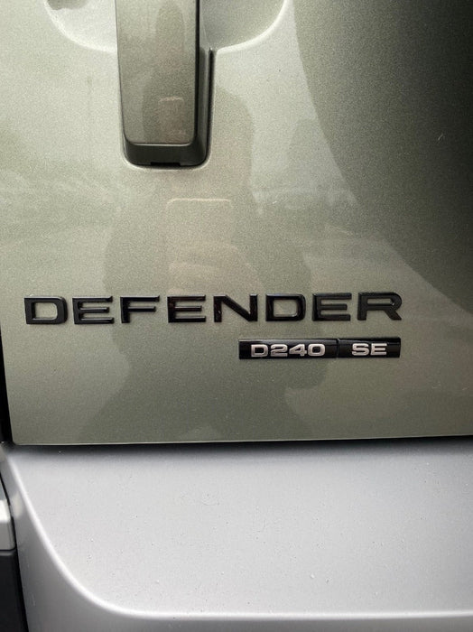 Land Rover Defender Rear Badge - Gloss Black